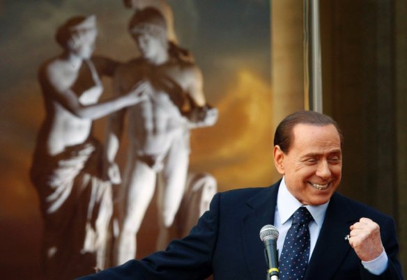 Italian Prime Minister Berlusconi smiles during the "Campus Mentis" (Brain Campus) award ceremony at Palazzo Chigi in Rome